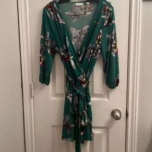 New York & Company stretch M. Green w/floral romper. Perfect for springtime!